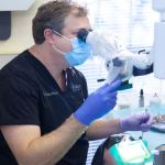 Dr. Weston at work on a patient at  {PRACTICE_NAME}